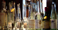 Oregon eau de vie line the back bar at Higgins